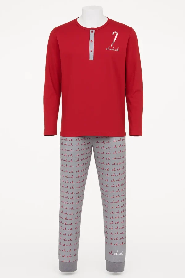 Men’s red and grey cotton pajama set featuring a red top with a candy cane and “Oh Oh Oh” print, and matching printed pants.